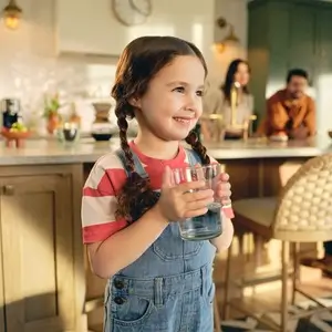Young Girl Loving Culligan Water